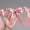 Pink, variant on AUNVITO Bow Wreath Banner Garland with 8 Bows for Birthday Party Bridal Shower Wedding Bridal Decor and Celebration Backdrop Hanging Decoration