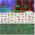 thumbnail image 5 of 12 hojas de tatuajes temporales navideños para niños, tatuajes temporales navideños que brillan en la oscuridad para niños, bolsas de regalo navideñas con decoraciones para fiestas de cumpleaños,, 5 of 5