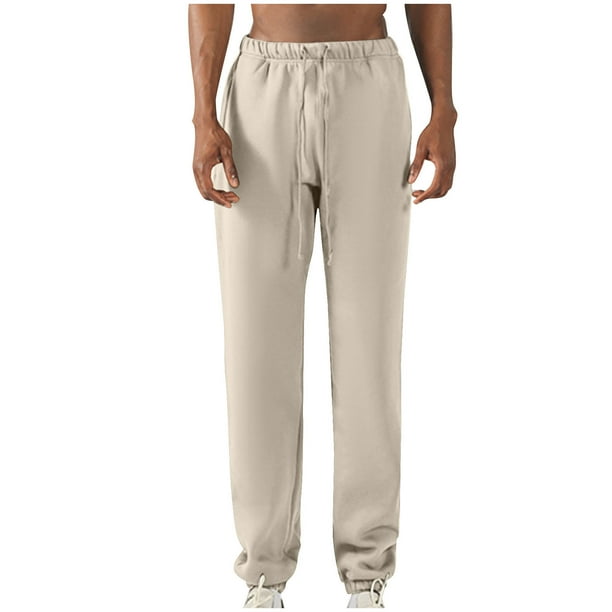 Pantalones largos para hombre, con cintura elástica, color liso, con cordón y bolsillos, de poliéster.
