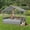 Gray, variant on Uforic Large Dog House Indoor Outdoor, Wicker Dog House with Waterproof Roof and Washable Cushion Blue,32.9"L x 27.6" W x 28.3" H