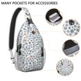 thumbnail image 2 of Sling Backpack,Blue Christmas Snowflake Pattern Sling Bag with Water Bottle Holder,Waterproof Sling Bag for Men/Women with Headphone Jack for Hiking,Travel, 2 of 6