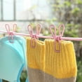 thumbnail image 5 of Portable Elastic Windproof Drying Clothes Hanger Clothes Line with 12 Clips Pink PP Steel Wire, 5 of 8