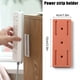 thumbnail image 1 of Retenedor De Enchufe Retenedor de enchufe montado en la pared Soporte de fijador de toma de corriente para el hogar sin perforaciones (naranja) Hugtrwg Libre de BPA, 1 of 6