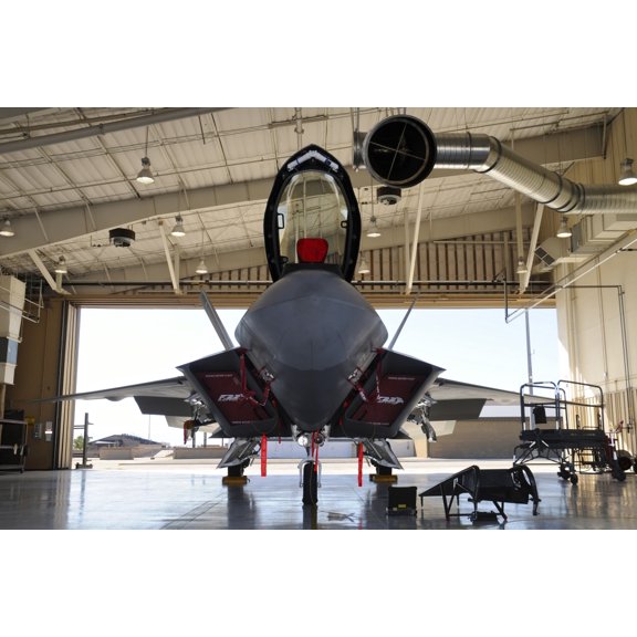 US Air Force F-22A Raptor parked in its shelter at Holloman Air Force Base Canvas Art - Riccardo NiccoliStocktrek Images (34 x 23)