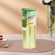 thumbnail image 5 of Tetera fría de 1L | Botella de agua para refrigerador de gran capacidad | Plástico, Blanco/Verde | Tapa a prueba de fugas, resistente a altas temperaturas, infusor de frutas | Taza de bebida para el, 5 of 6