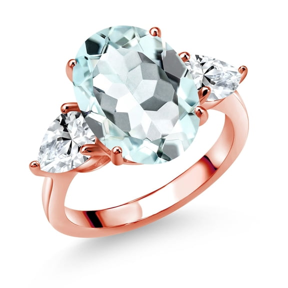 Gem Stone King 18K Rose Gold Plated Silver Sky Blue Simulated Aquamarine and White Created Sapphire Ring for Women (7.70 Cttw, 14X10MM Oval and 7X5MM Pear Shape, Gemstone, Size 9)