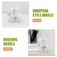 thumbnail image 2 of GOOHOCHY Estatua de ángeles abrazados, figura de ángel niño, estatua de resina de ángel, decoración de boda, 2 of 8