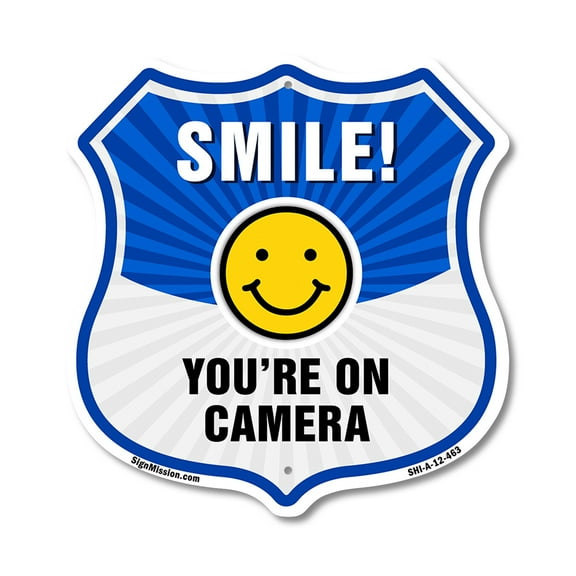 Smile You're On Camera Shield Sign Smile You're On Camera 12 inch X 12 inch Shield-Shaped Rust-Free Aluminum Metal Sign Weather Resistant, UV Protected for Workplace Made in the USA
