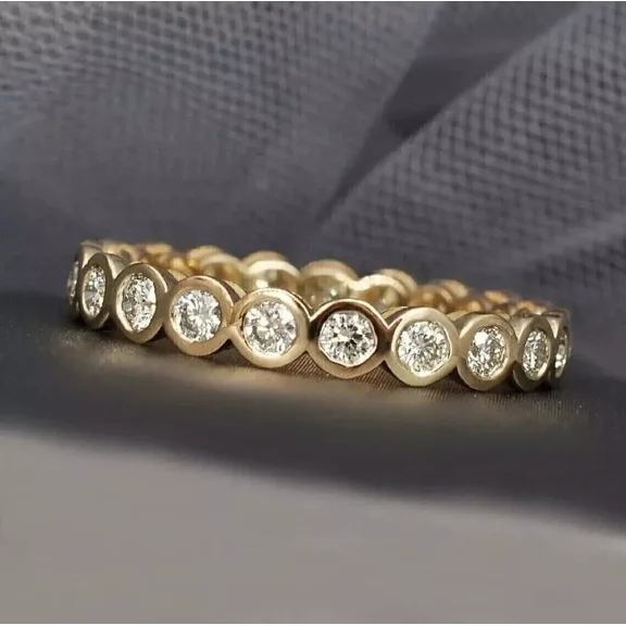 1 Ct Round Cut Bezel Set Lab Created Diamond Eternity Wedding Band Ring 14K Yellow Gold Plated 925 Silver