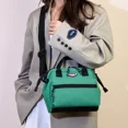 thumbnail image 4 of Bolso de mano para madre y bebé de lona de gran capacidad de color sólido de venta caliente 2024 nuevo bolso cruzado con cremallera para mujer, 4 of 5