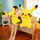 thumbnail image 4 of 25-55cm Pokemon Pikachu juguetes de peluche almohada Kawaii Japón Anime Elf muñeco de peluche suave relleno de dibujos animados muñeco de Pikachu regalo de Navidad para niños, 4 of 5