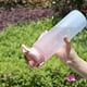 thumbnail image 2 of Botella de agua de gran capacidad de 1000ml, botella de agua de gran potencia, botella de agua con pajitas, manijas y marcas de tiempo, se puede transportar con un solo clic., 2 of 4