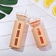 thumbnail image 2 of Toystoory Botellas de vidrio de silicona Botella de agua simple Botella de vidrio respetuosa con el medio ambiente Vasos de paja Rosa Gris Almacenamiento y organización del hogar, 2 of 6