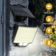 thumbnail image 4 of Luces solares para exteriores, 106 luces LED de 3000 lm con sensor de movimiento solar con control remoto, luces de pared de seguridad solares LED de anochecer a amanecer con cabina de 16,5, 4 of 5