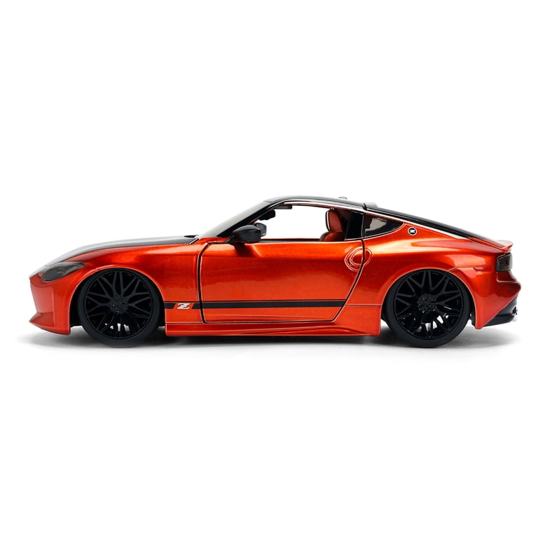 2023 Nissan Z Orange Metallic with Carbon Hood and Black Top 