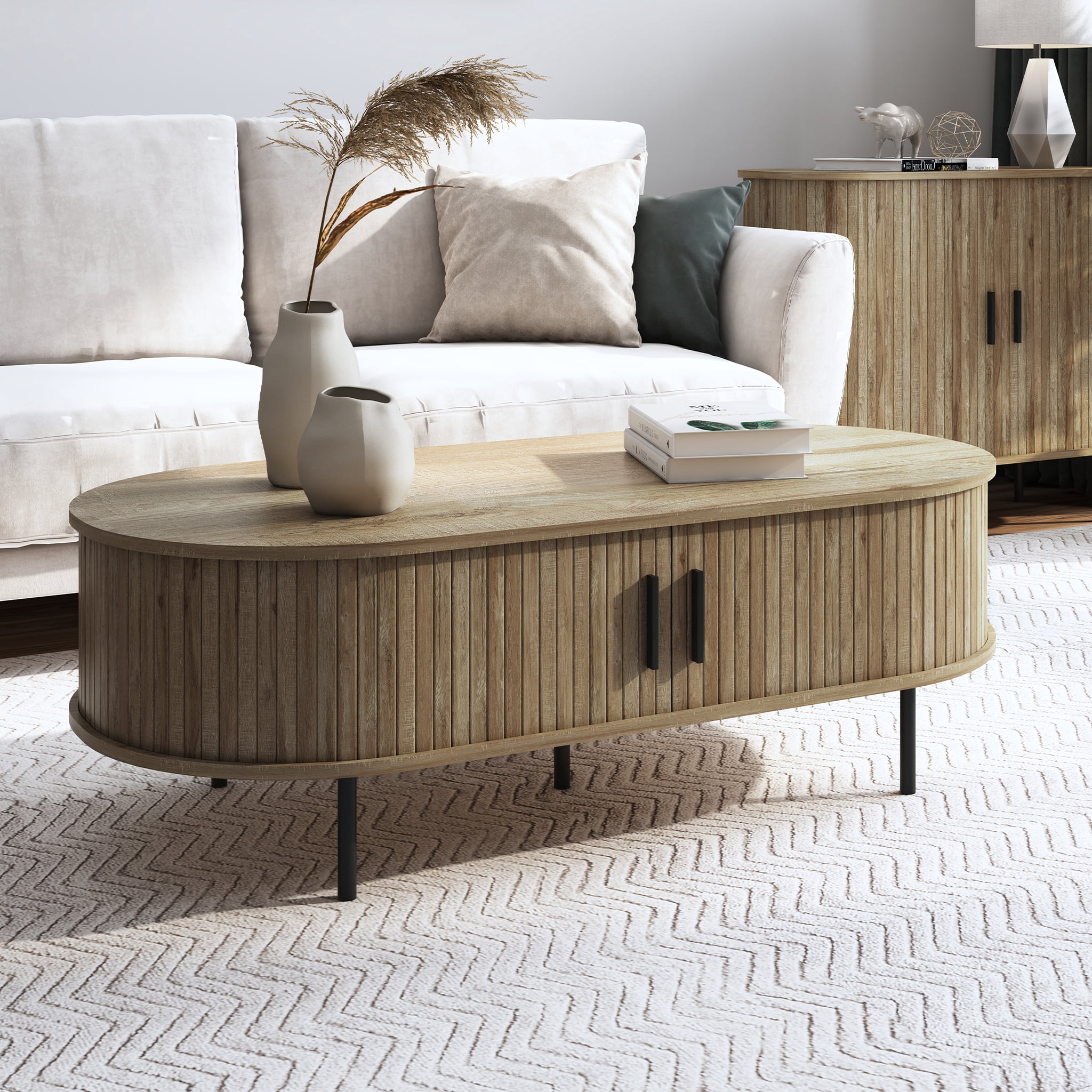 LuxenHome Oval Coffee Table with Storage, 47" Mid Century Modern Fluted Coffee Tables for Living Room, Wooden Sliding Door Boho Storage Center Table for Home, Office