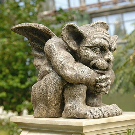 Design Toscano Emmett the Gargoyle Garden Statue Let the Emmett the Gargoyle Garden Statue watch over your garden or front entryway. Crafted from durable resin  this friendly gargoyle adds a historic charm to any home. About Design Toscano: Design Toscano is the country s premier source for statues and other historical and antique replicas  which are available through our catalog and website.We were named in Inc. magazine s list of the 500 fastest growing privately-held companies for three consecutive years - an honor unprecedented among catalogers.Our founders  Michael and Marilyn Stopka  created Design Toscano in 1990. While on a trip to Paris  the Stopkas first saw the marvelous carvings of gargoyles and water spouts at the Notre Dame Cathedral. Inspired by the beauty and mystery of these pieces  they decided to introduce the world of medieval gargoyles to America in 1993