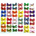 thumbnail image 1 of 60 uds lindo cachorro perro pequeño lazo lazos para el cabello con bandas de goma accesorios para el cabello hechos a mano lazo para el cuidado de mascotas Color al azar, 1 of 5