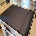 thumbnail image 5 of High-Temp Resistant Thickened Rubber Stove Protector Mat - Modern Simple Design Multifunctional Kitchen Gadget, 61.5x53cm, 550g, Customizable Logo Available, Includes 2 Hooks - Durable, Washable,, 5 of 5