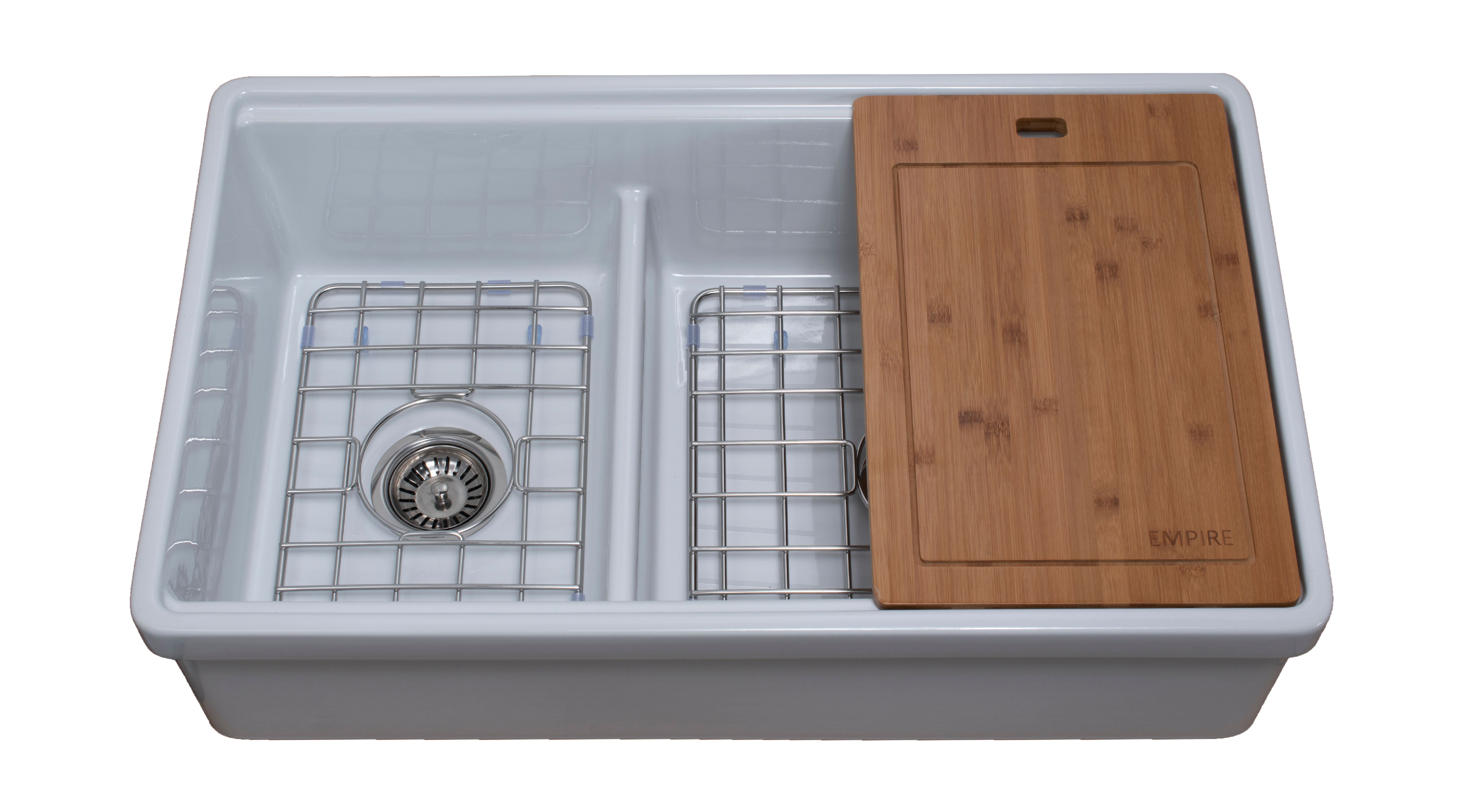 kitchen sink with cutting board and strainer