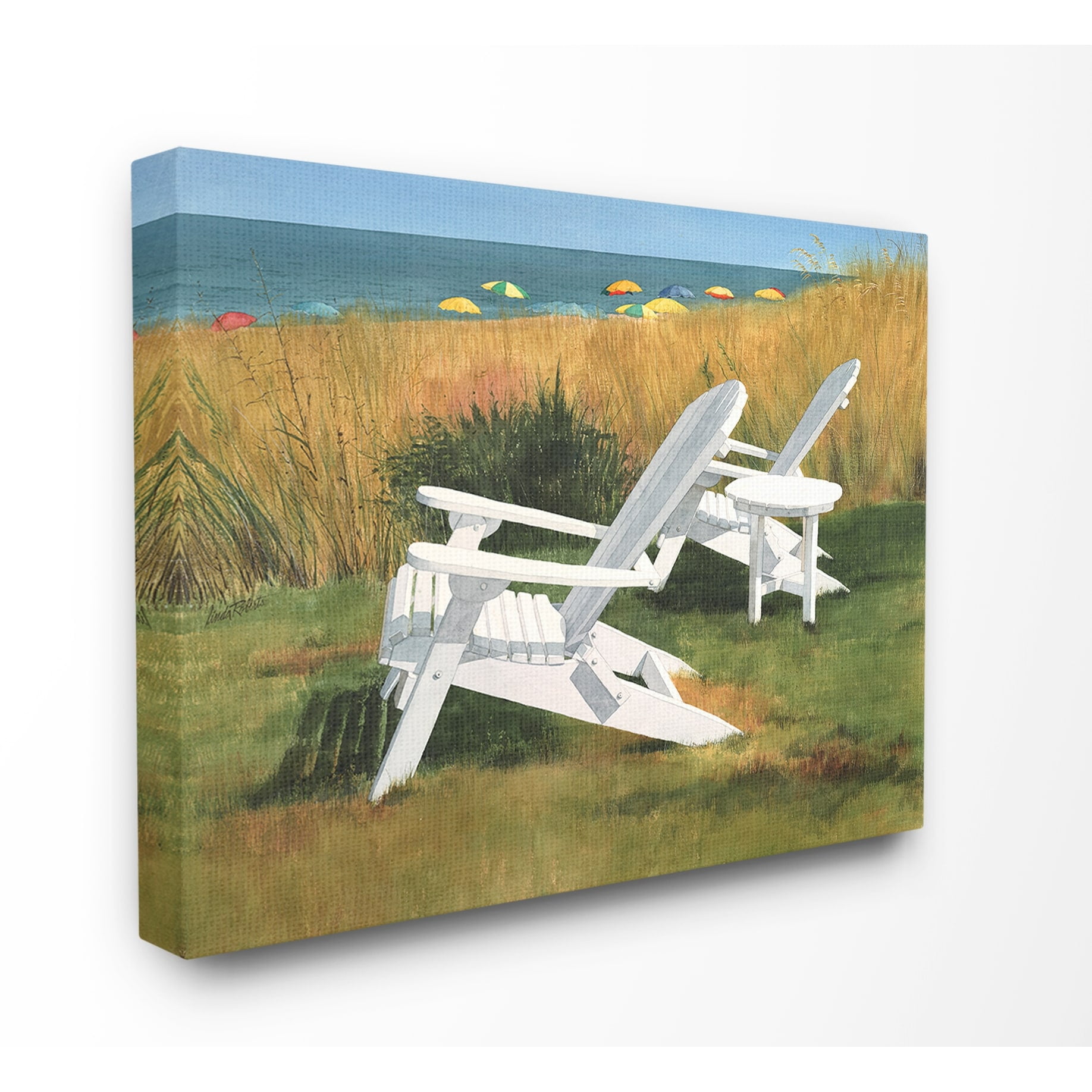 The Stupell Home Decor Two White Adirondack Chairs by Umbrella Beach Canvas Wall Art