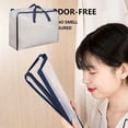 thumbnail image 2 of Small Clear PVC Storage Bag with Reinforced Handles and Double Zipper, Foldable Bedding Organizer for Clothes, Quilts, Blankets, Moving and Closets, 2 of 8
