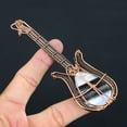 thumbnail image 4 of Natural Owhyee Blue Opal Handmade Copper Wire Wrap Guitar Pendant 4.53, 4 of 4