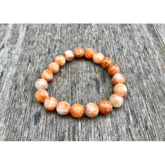 Natural Orange Calcite 10mm round Shape faceted Cut Beads Stretchable Bracelet for Men & Women.