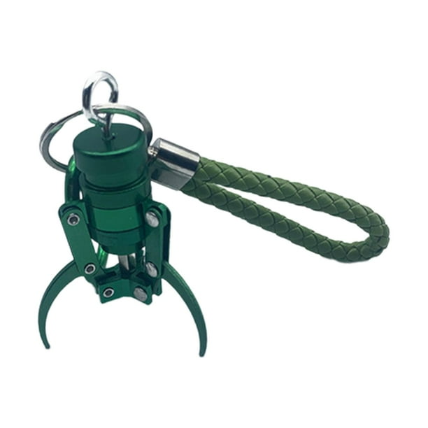 Llavero con forma de garra y grúa para niños. Verde