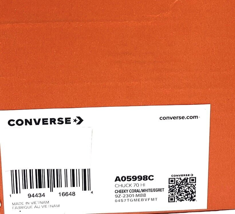 White converse clearance with orange tag