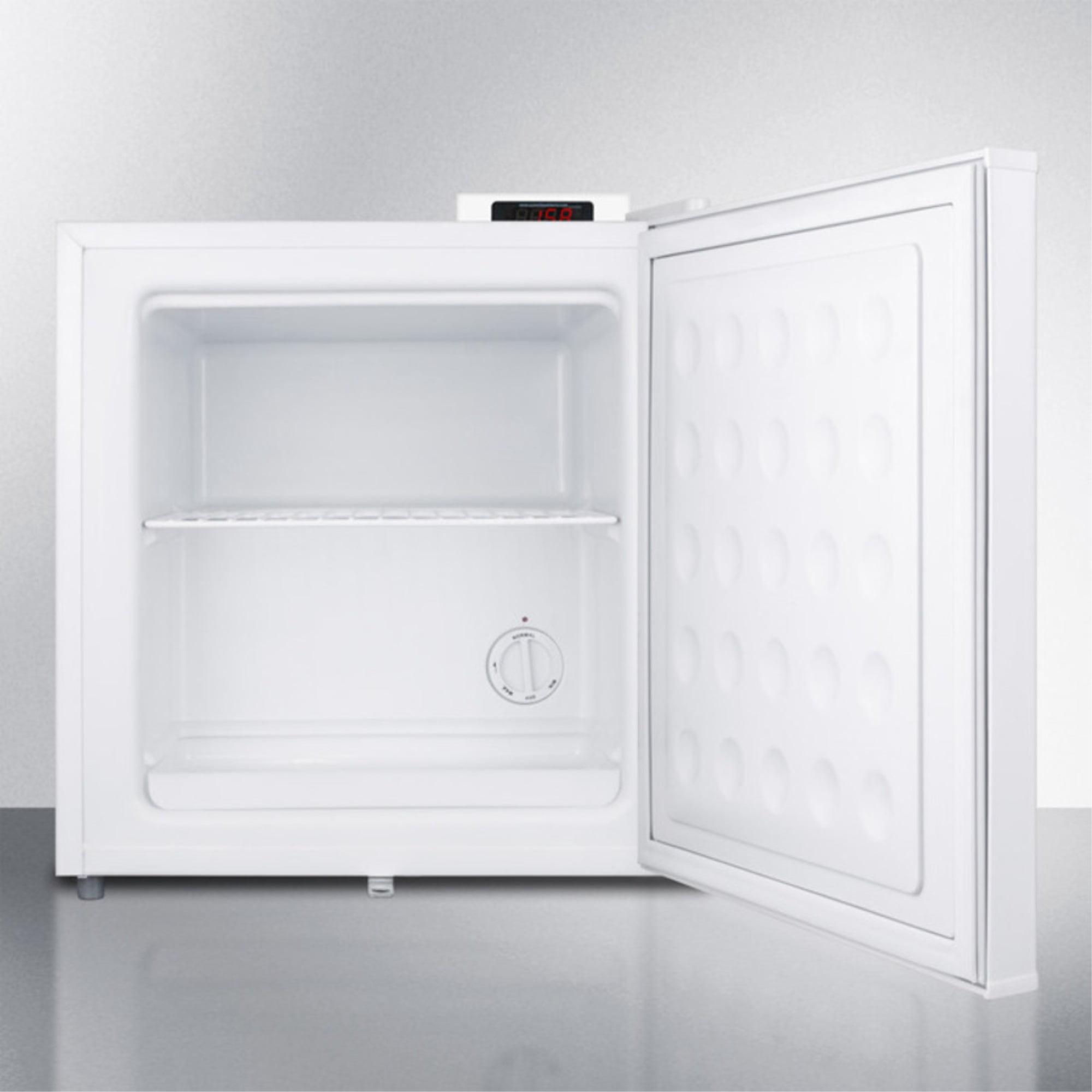 Compact -20 C vaccine storage all-freezer with digital thermostat, temperature alarm, hospital grade cord, self-closing door, and front lock