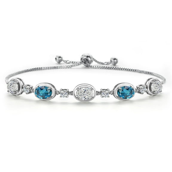 Gem Stone King 925 Sterling Silver White Lab Grown Diamond and London Blue Topaz Bracelet for Women | 4.10 Cttw | Gemstone April Birthstone | Oval 7X5MM | Fully Adjustable 9 inch
