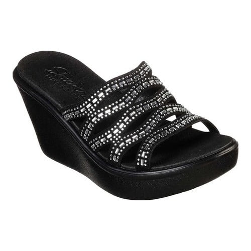 black dress with tan wedges