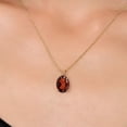 thumbnail image 3 of Gem Stone King 14K Yellow Gold Red Garnet Pendant Necklace for Women | 2.80 Cttw | Gemstone January Birthstone | Oval 10X8MM | With 18 inch Chain, 3 of 6