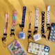 thumbnail image 3 of Cordón Para Teléfono Móvil , Cuerda De Cuello , Corea KPOP BTS En Mantequilla Dinamita PTD De Mano Anillo De Muñeca Correa Portátil USB Llave Cadena De La Bolsa De Extraíble, 3 of 4