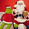 thumbnail image 2 of Grinch Jumbo Plush, 48 Inches Tall, Dressed in a Santa Shirt and Hat, by Ruz, 2 of 5