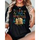 thumbnail image 1 of Camisetas con gráficos clásico para mujeres y adolescentes y niñas, playera de verano con estampado estéticoWomen's Casual Graphic Tee - "This Is How I Fight My Battles" Book & Floral Print Design,, 1 of 7