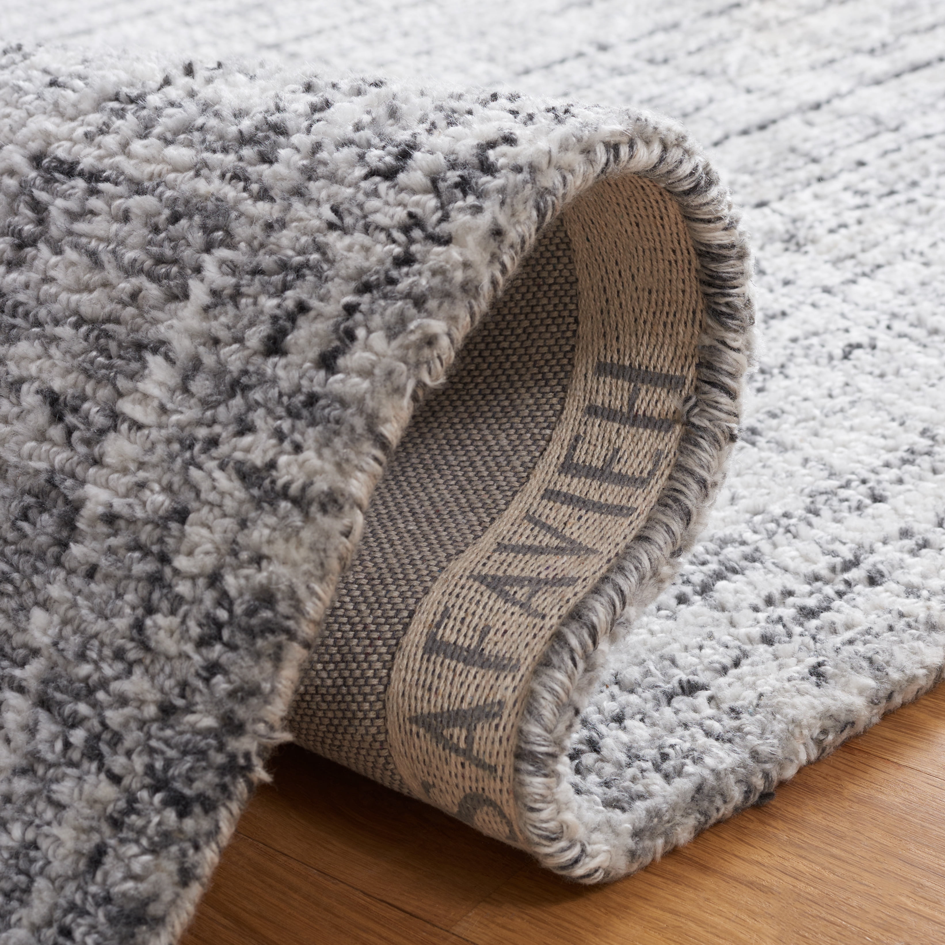 SAFAVIEH Abstract Charlie Striped Polyester Area Rug, Grey/Ivory, 6' x 6' Round