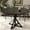 Black Iron + Black, variant on 47-inch Round Dining Table for 4, Solid Wood Circular Tabletop with 4 Sections, Heavy-Duty Metal Pedestal Base, Perfect for Kitchen, Dining Room, Living Room, Black & Brown Oak Finish