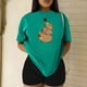 thumbnail image 3 of Playera Blusa De Familia Capybara Ropa Para Mujer Capibara Color Verde Talla Mediana Marca Emil SaEs, 3 of 4