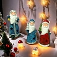 thumbnail image 6 of HCTSHG 3 Pcs Christmas Santa Claus Figurines 6'' Standing Christmas Figurines Ornaments Handcrafted Night Light Crafts Resin Santa Sculpture Holding Lantern Book Cane for Home Decor Gift, 6 of 9