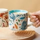 thumbnail image 2 of Taza de cerámica de 15 oz para café, pintada a mano, para desayuno (azul claro), 2 of 5