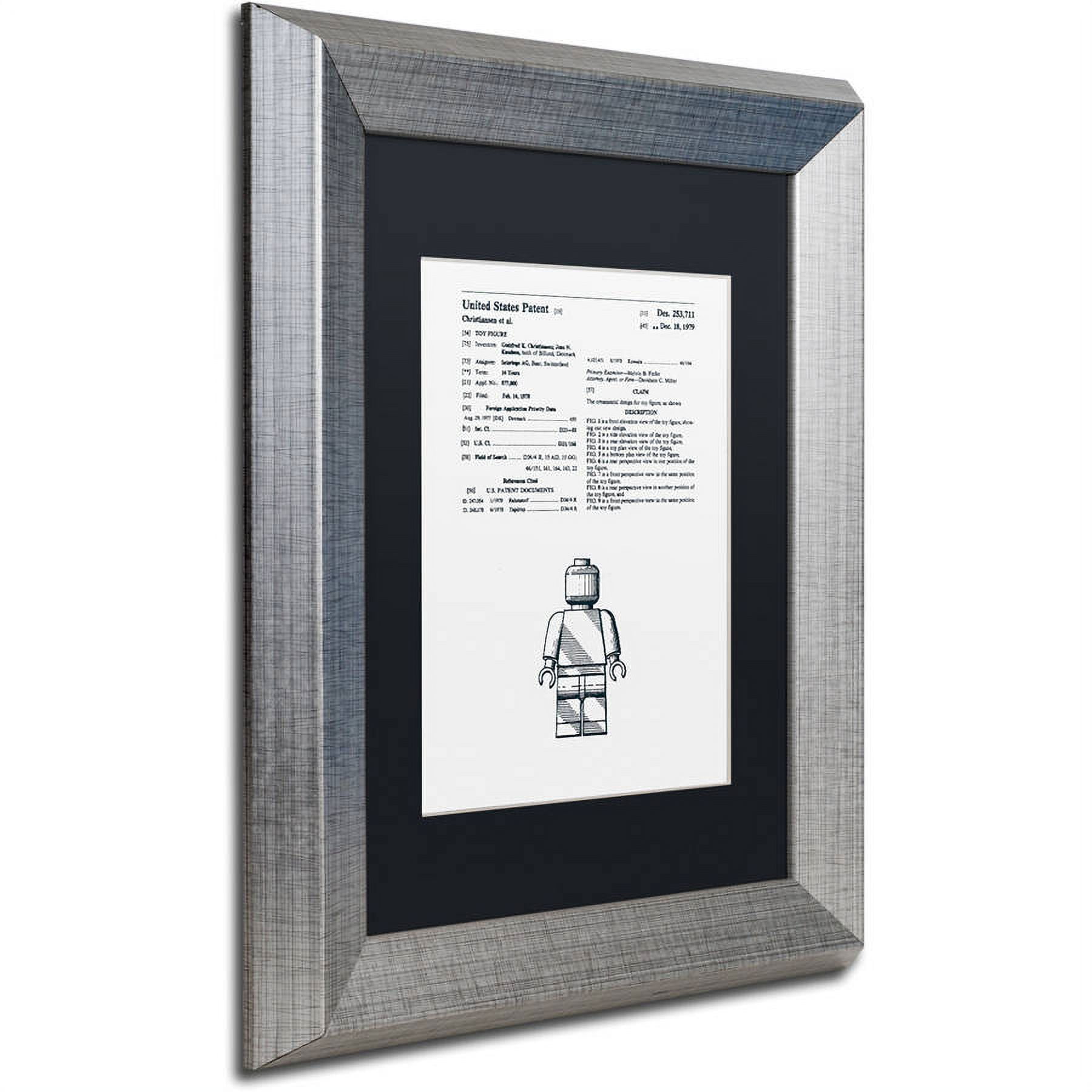 Trademark Fine Art "Lego Man Patent 1979 White" Canvas Art by Claire Doherty, Black Matte, Silver Frame