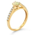 thumbnail image 3 of Gem Stone King 10K Yellow Gold White Ethiopian Opal and White Lab Grown Diamond Engagement Ring for Women (0.50 Cttw, Oval Cabochon 6X4MM, Gemstone Birthstone, Size 8), 3 of 4