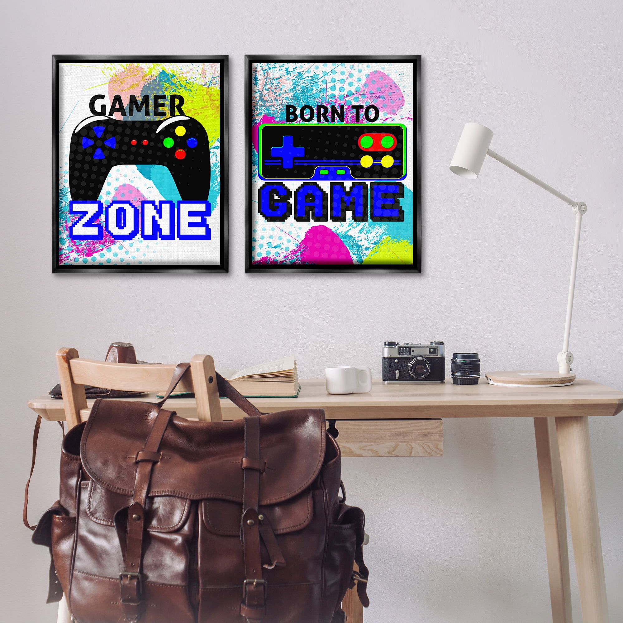 Stupell Industries Gamer Zone Splash Remote Entertainment Painting Black Floater Framed Canvas Art Print Wall Art, 31 x 25, Set of 2