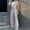 Gray, variant on HOZADOIE Womens Blazer Suits 2 Piece Set Business V Neck Sleeveless Button Front Blazer Vest Pleated Slightly Flared Wide Leg Blazer Pants Sleek Office Work Suit Set