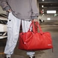 thumbnail image 3 of Bolso de viaje de lona para el fin de semana, bolso de noche, de piel sintética, para hombres, mujeres, gimnasio, deportes, trabajo, rojo, L, 3 of 8