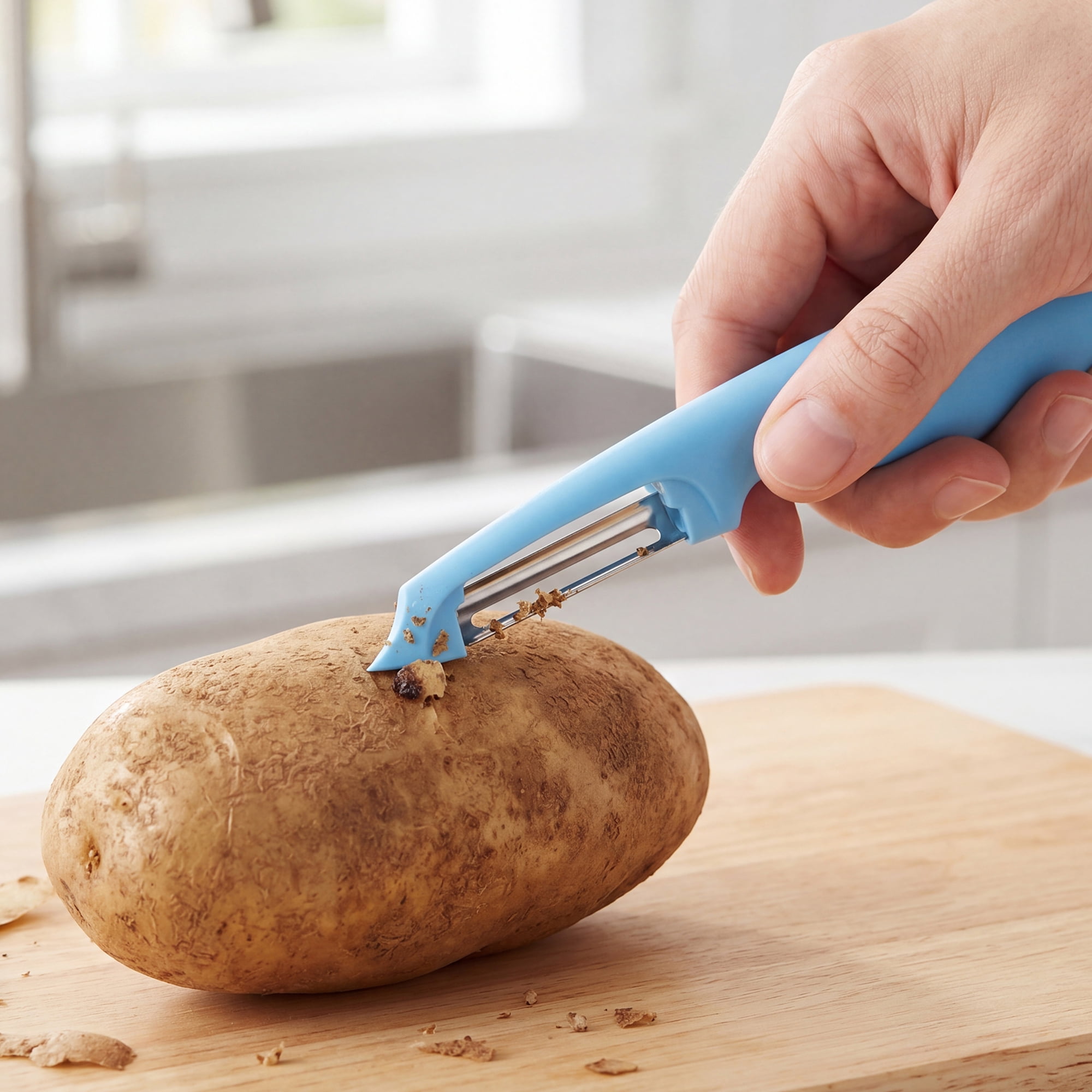 Unique Bargains Plastic Vegetable Peeler with Ergonomic Handle for Peeling Blue 7.3x1 inch