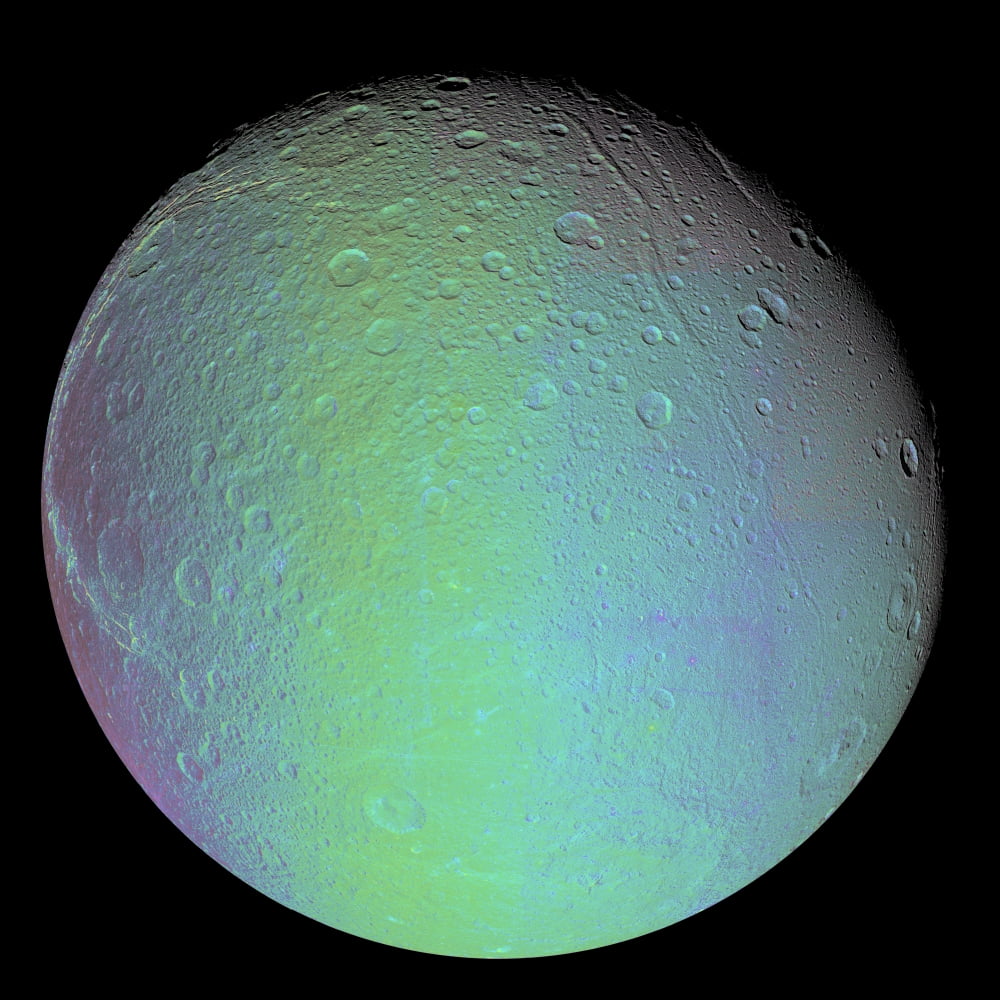 False color view of Saturns moon Dione Stretched Canvas - Stocktrek ...