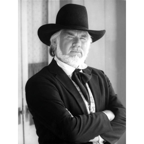 Kenny Rogers with his arms crossed wearing a cowboy hat Photo Print (8 x 10)